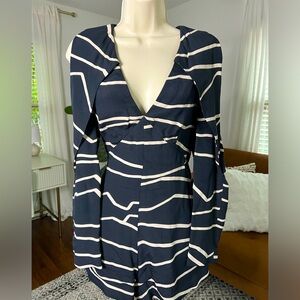 Size small black with cream stripes long sleeved romper with shoulder detailing